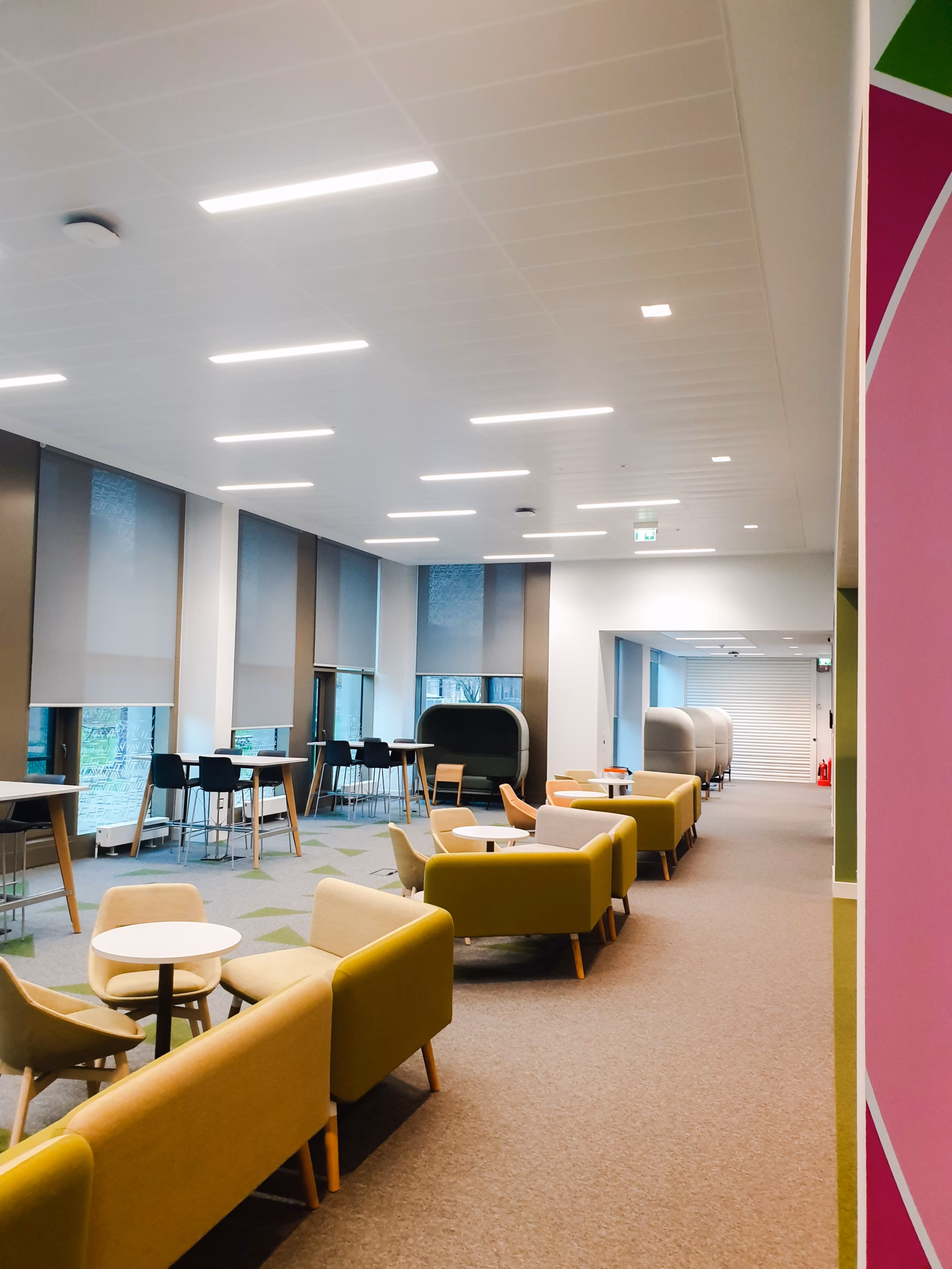 Image showing a social space with various seating options after completion of University of Edinburgh nucleus building
